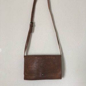 Spanish leather cross body  with intricate details